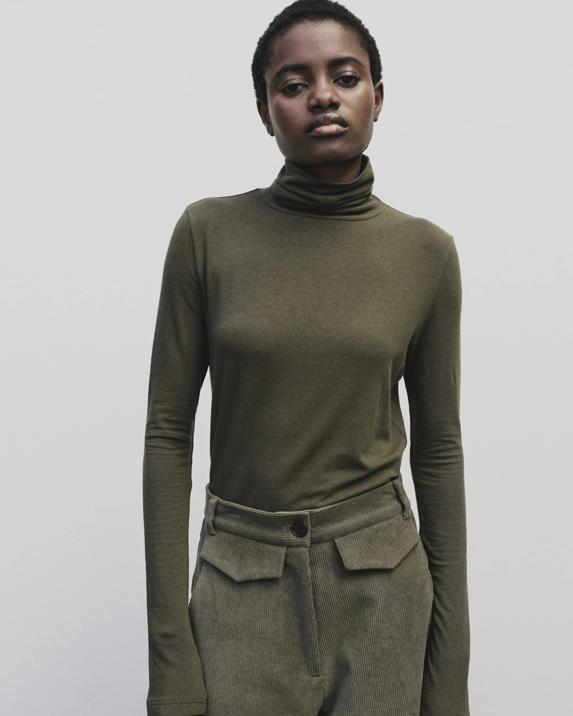 LEO BOUTIQUE Roll Neck Jersey Top | Light Olive MIJEONG PARK 