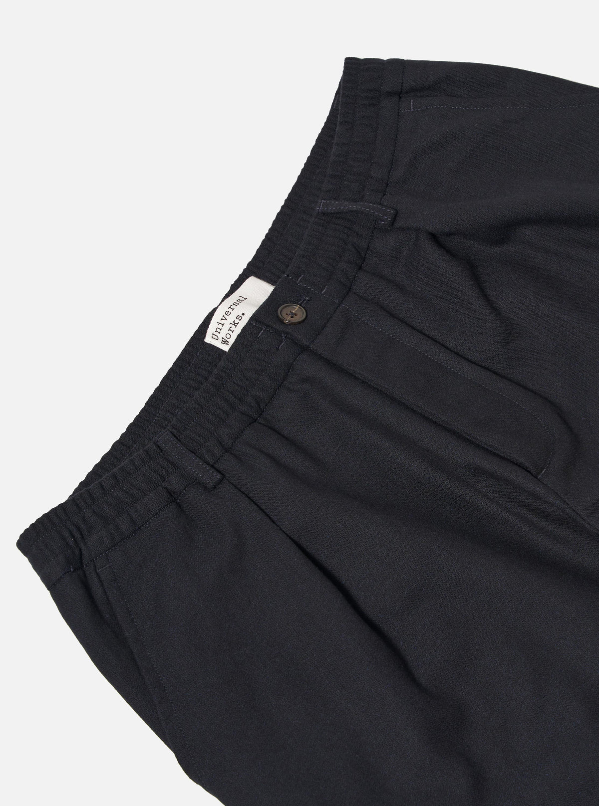 UNIVERSAL WORKS Pleated Track Pant | Dark Navy Tweed LEO BOUTIQUE