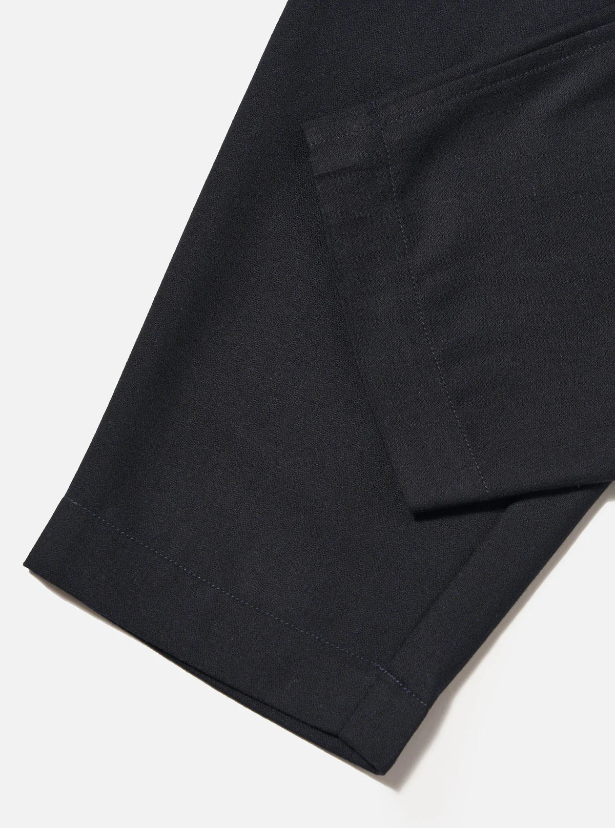 UNIVERSAL WORKS Pleated Track Pant | Dark Navy Tweed LEO BOUTIQUE