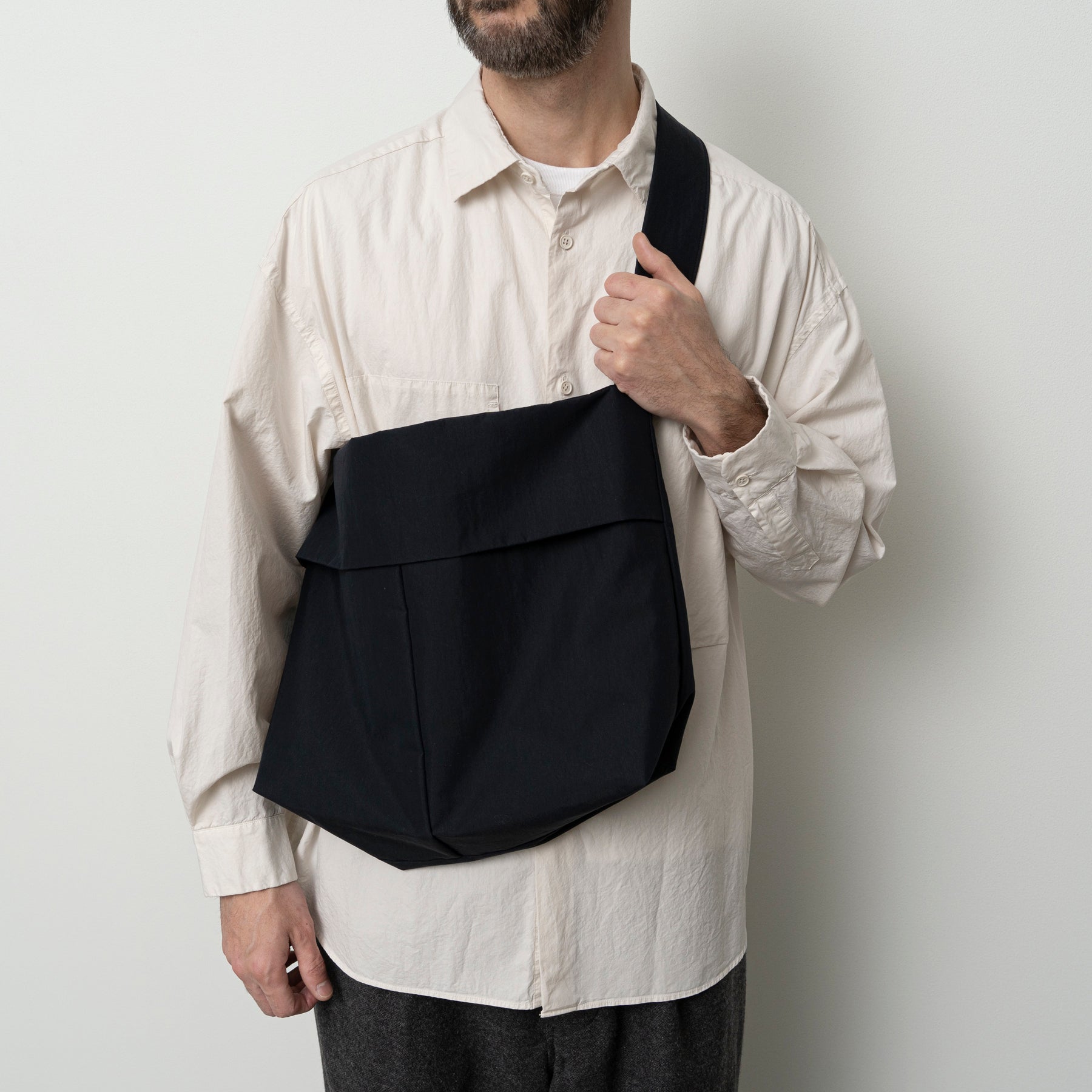 STILL BY HAND Padded Crossbody Bag | Ink Black LEO BOUTIQUE