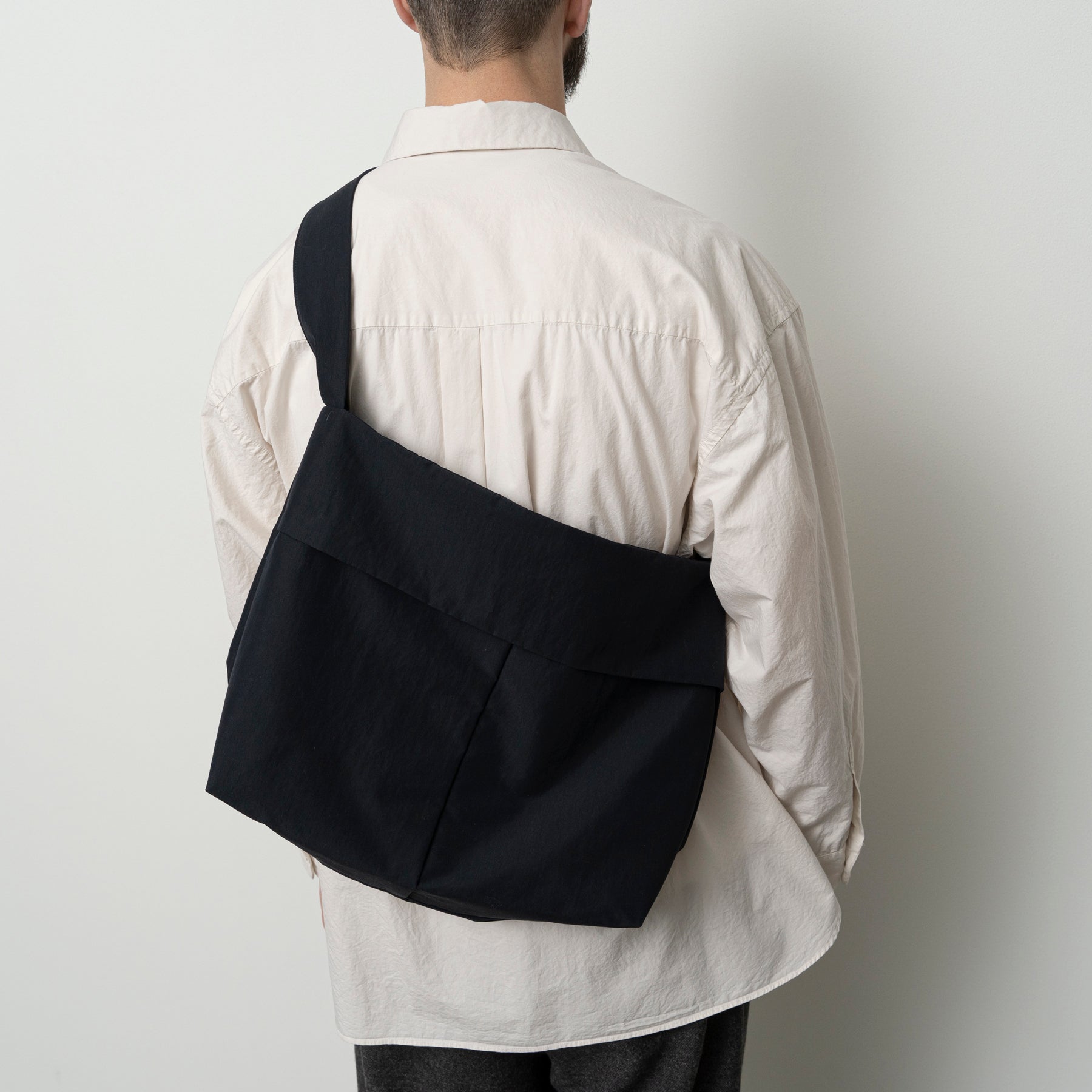 STILL BY HAND Padded Crossbody Bag | Ink Black LEO BOUTIQUE