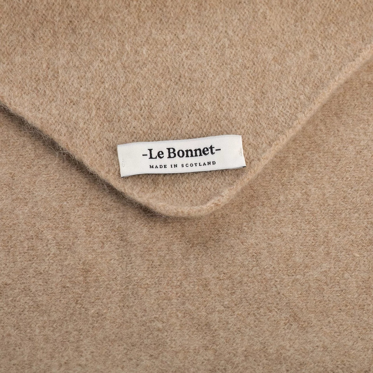 LE BONNET Knitted scarf | Sand LEO BOUTIQUE