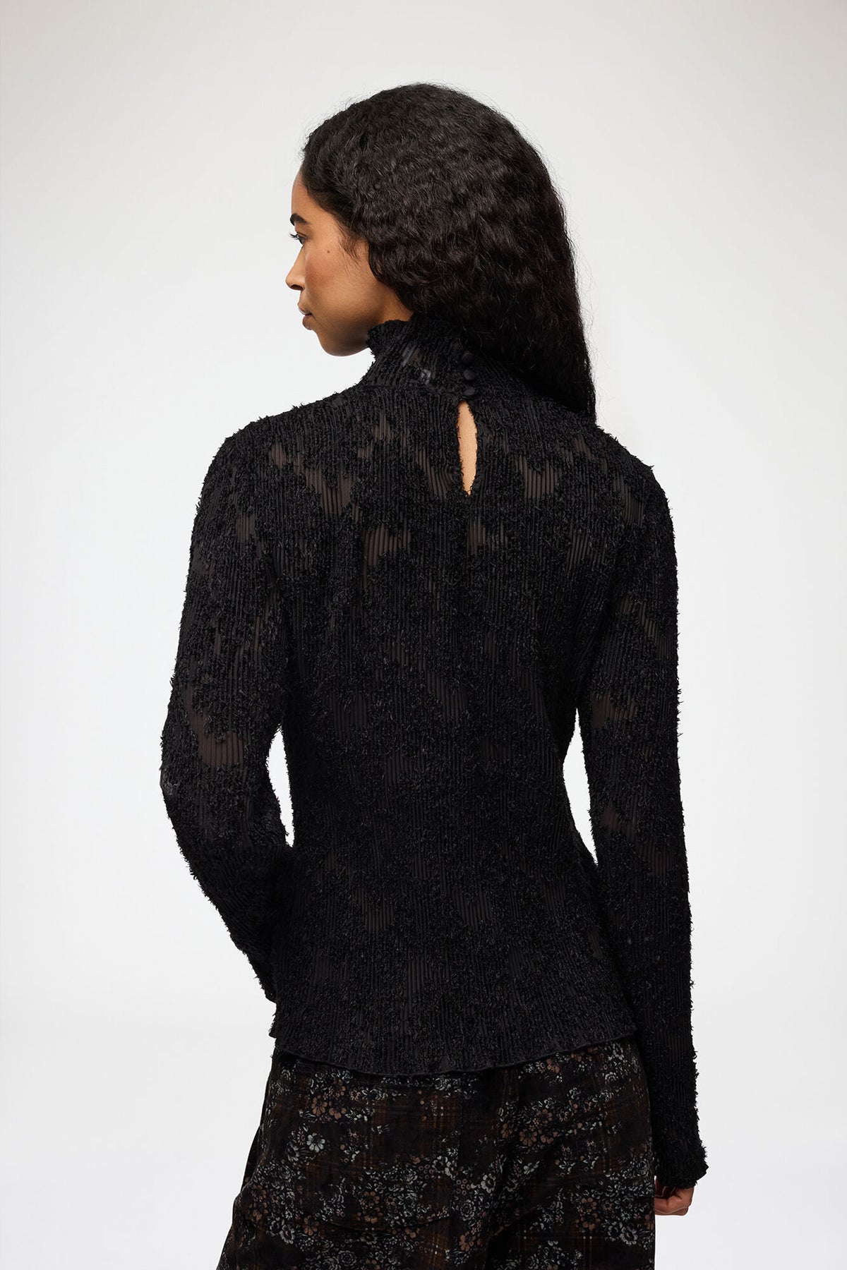 LEO BOUTIQUE Pleated Fil Coupe Turtleneck | Black GANNI