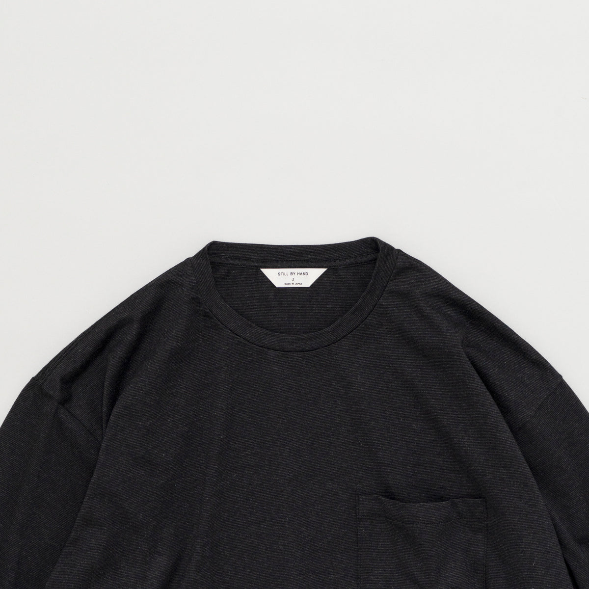 STILL BY HAND Loose Pocket L/S | Charcoal LEO BOUTIQUE
