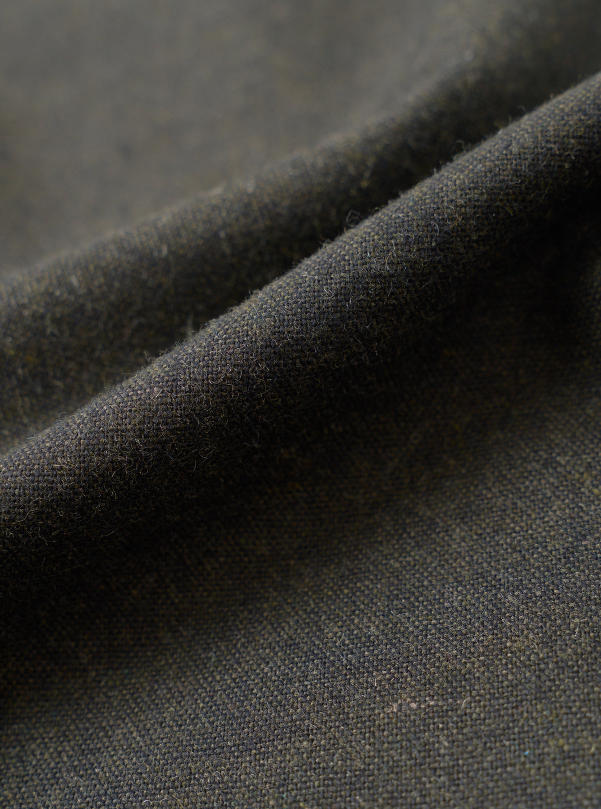 UNIVERSAL WORKS Pleated Track Pant | Recycled It Tweed | Olive LEO BOUTIQUE 