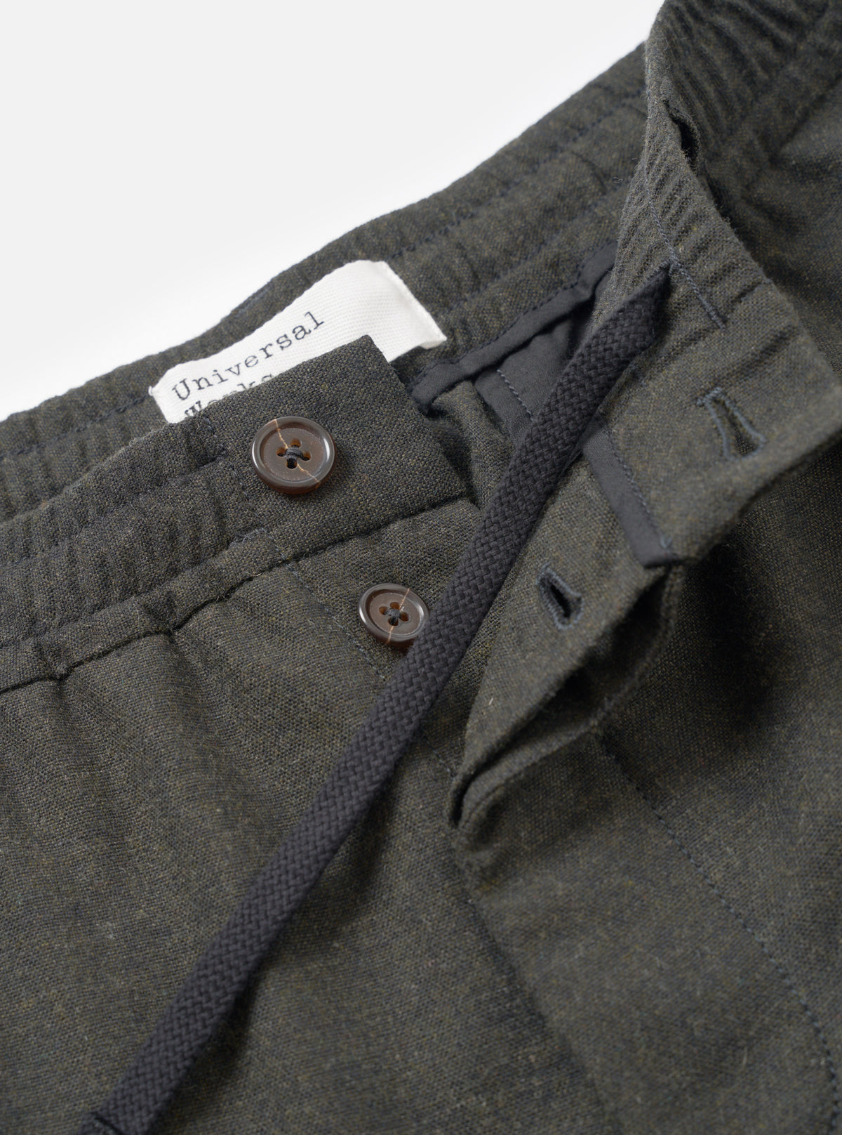 UNIVERSAL WORKS Pleated Track Pant | Recycled It Tweed | Olive LEO BOUTIQUE 