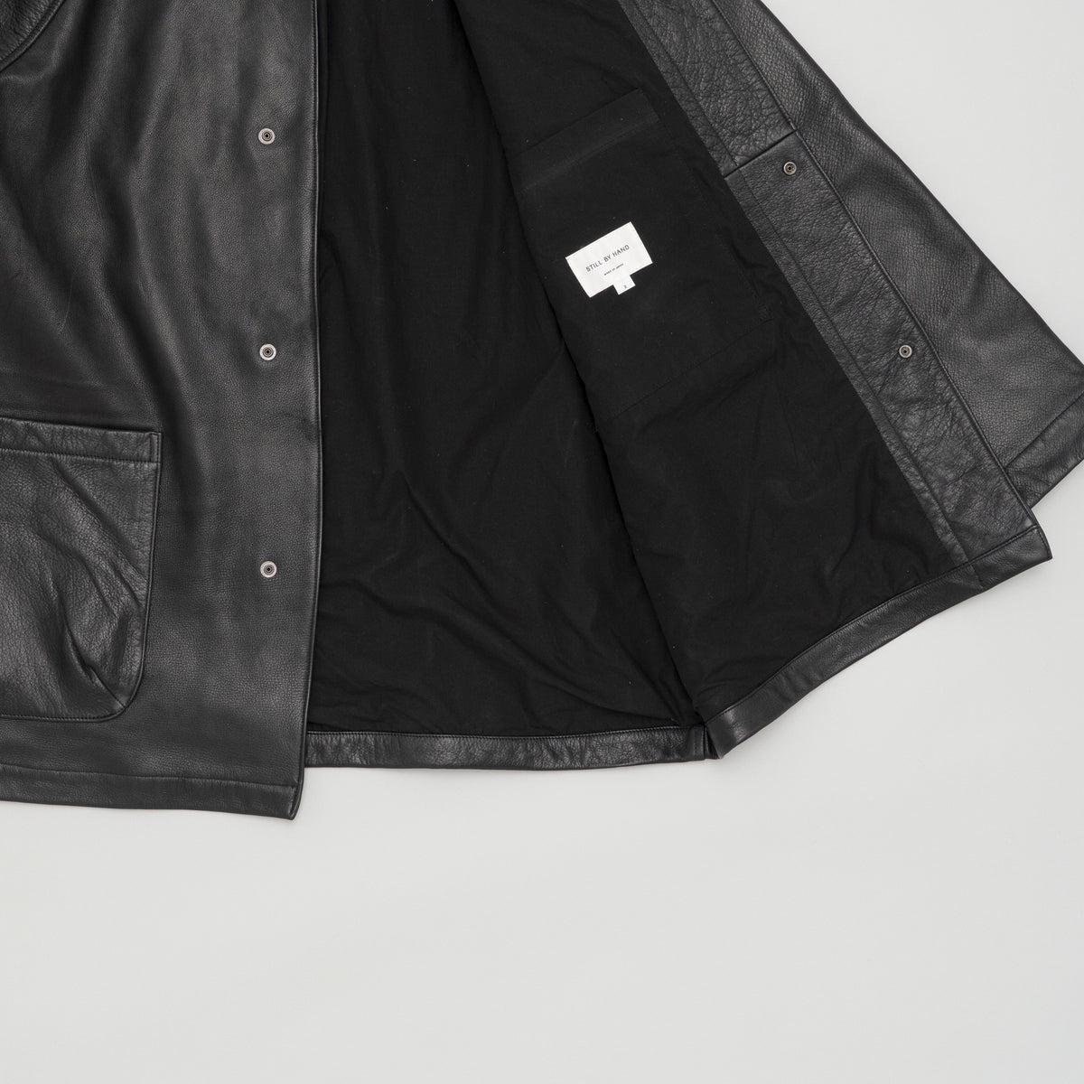 STILL BY HAND Leather Half Coat | Black LEO BOUTIQUE