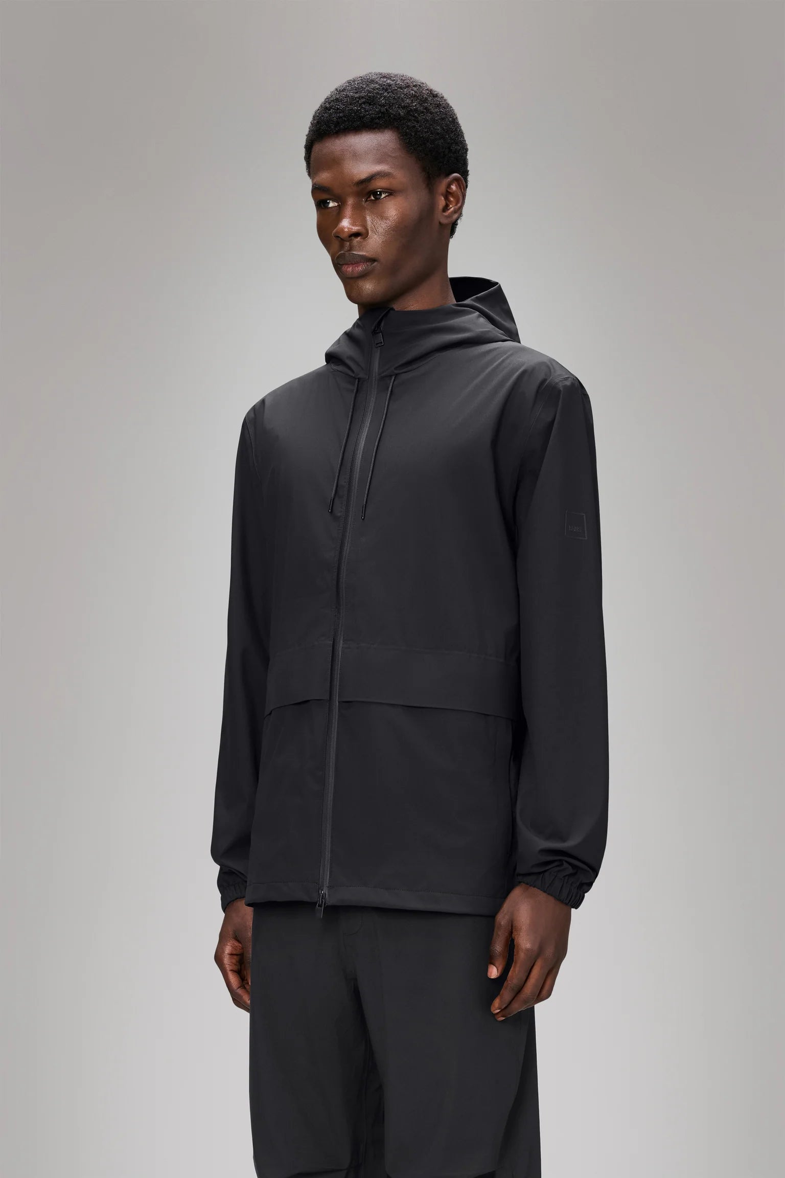 RAINS Suva Hardshell Pocket Jacket | Black LEO BOUTIQUE